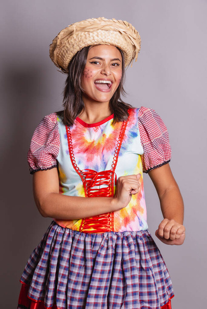 Brazilian woman wearing country clothes, So Joo party, Junina party. photo poses  - Photo, image