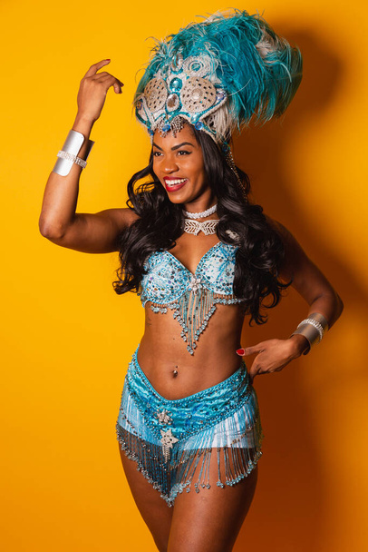 Vertical shot, half body, beautiful black Brazilian woman at Carnaval. - Photo, Image