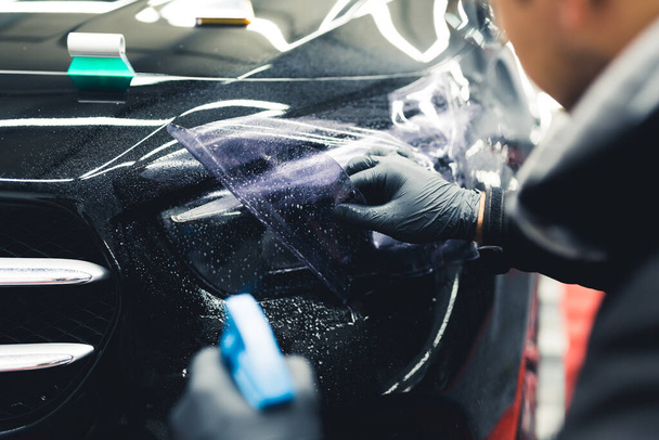 Professional car detailing center - making cars shiny and well maintained. High quality photo - 写真・画像