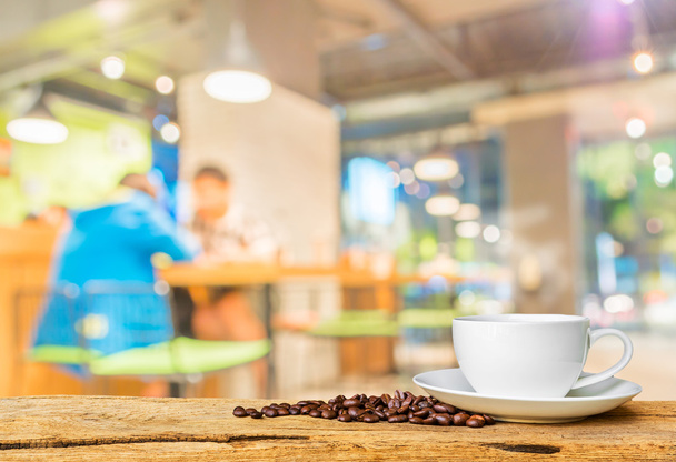 Coffee shop blur background with bokeh image. - Photo, Image
