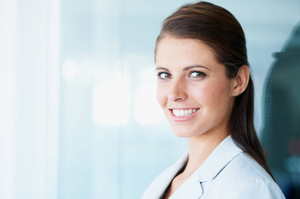 Face, business woman and happy in office with pride for career or job. Professional, entrepreneur or portrait of female executive or person from Australia with confidence, proud or mockup space. - Photo, Image