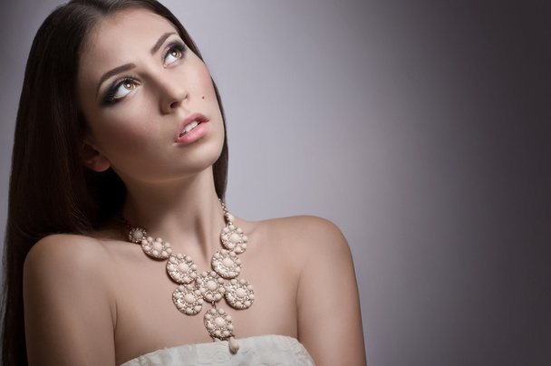Woman with makeup and modern necklace - Foto, Imagem