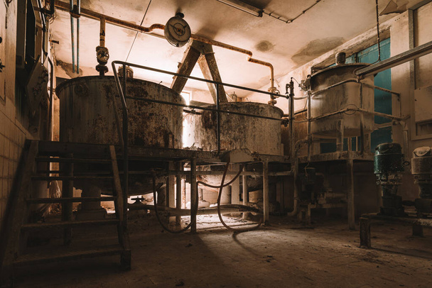 Old and rusty abandoned industrial plant, forgotten historical factory, Lost Place - 写真・画像