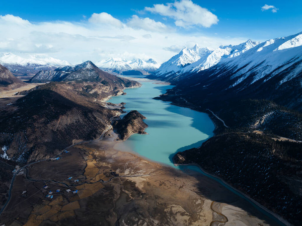 Aerial view of beautiful snow mountains and lake in Tibet,China - Фото, зображення