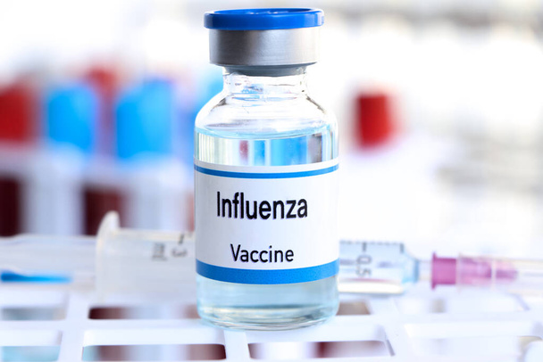 Influenza vaccine in a vial, immunization and treatment of infection, vaccine used for disease prevention - Fotografie, Obrázek
