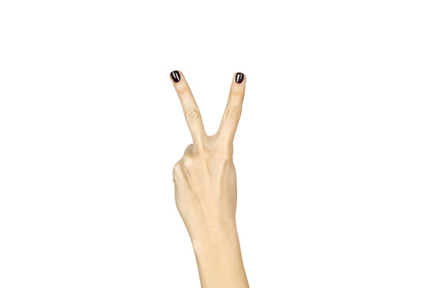 weibliche Hand zeigt Nummer-zwei-Zeichen isoliert über Weiß - Foto, Bild