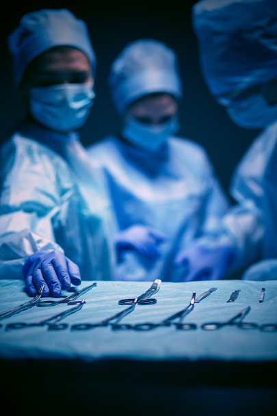 Team surgeon at work in operating - Valokuva, kuva