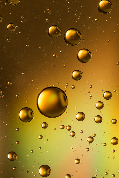 Huile et eau abstraites en or
 - Photo, image