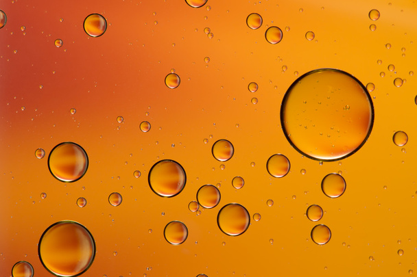 Öl- und Wasserabstrakt in Orange - Foto, Bild