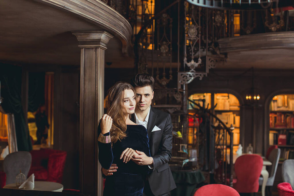 Sexual passionate couple in elegant evening dresses. Luxurious interior. Fashion shot. - Φωτογραφία, εικόνα