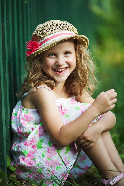 Happy little girl cheerfully laughs - Foto, Imagem