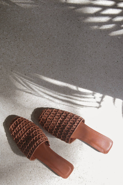 Handmade raffia mules. Sustainable ethically made pair of slippers. Responsibly sourced shoes with eco-friendly materials. - Photo, Image