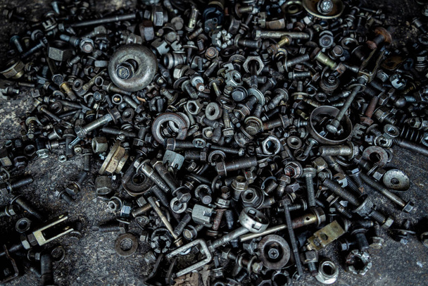Abstract background with metal nuts and bolts. - Zdjęcie, obraz