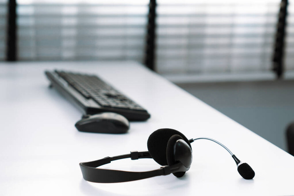 Close up image of headphones for competent online working. Customer service operator equipments. - Valokuva, kuva