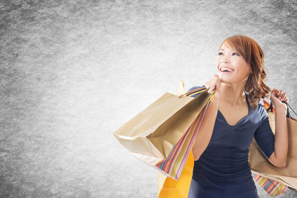 Cheerful shopping woman - Foto, afbeelding
