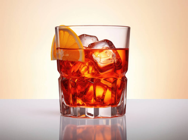 Negroni Cocktail in crystal glass with ice cubes and orange slice - Photo, Image