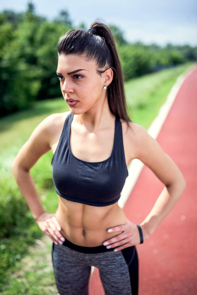 Hot Sports Woman on Jogging Track Ready to Run  - Photo, image