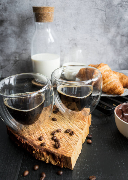 Coffee with milk. Morning. On a dark background. Breakfast - Foto, Imagem