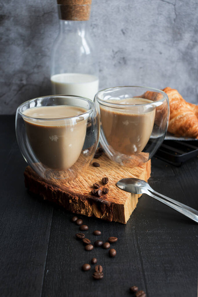 Coffee with milk. Morning. On a dark background. Breakfast - Φωτογραφία, εικόνα