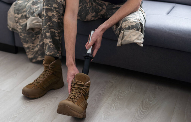 soldier after leg amputation is rehabilitated and recovers thanks to the prosthesis. - Photo, image