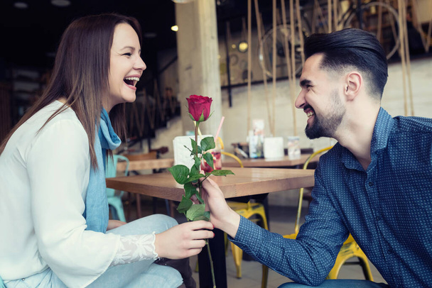 Smiling Young Love Couple with Red Rose - Photo, Image
