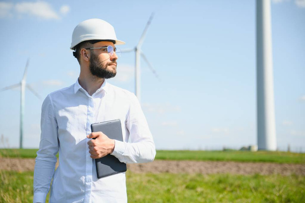 Power engineer are working with wind turbines - Fotografie, Obrázek
