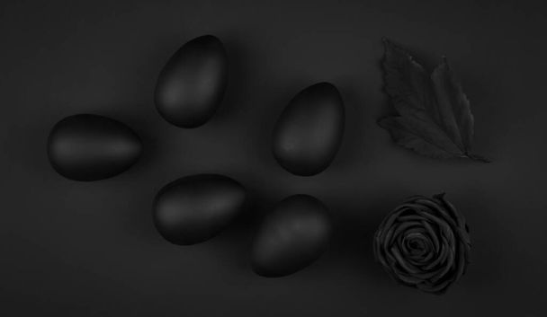 Oeufs noirs de Pâques isolés sur fond noir - Photo, image