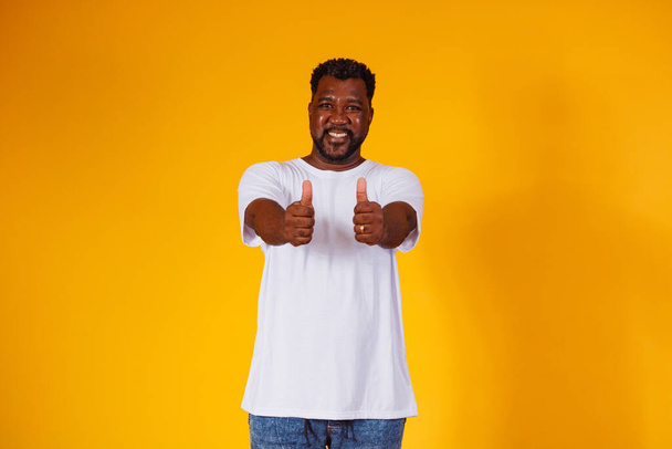 black man with thumb up - Фото, изображение