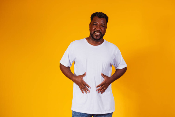 black man with stomach ache - Valokuva, kuva