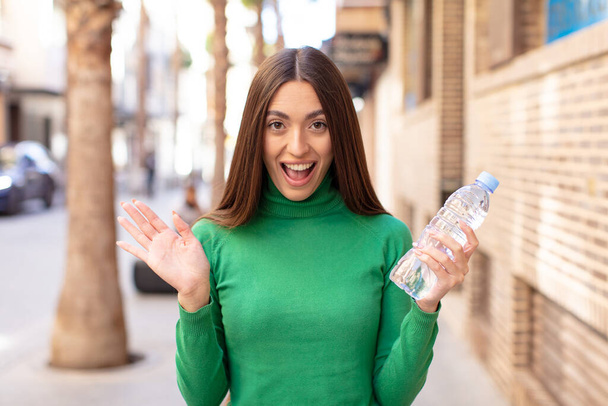 feeling happy and astonished at something unbelievable. water bottle concept - Foto, immagini