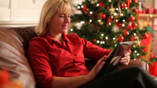 Woman using a digital tablet - Video