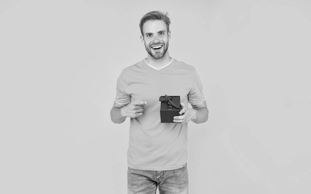 happy man with box. boxing day. present and gifts buy. shopping guy with purchase. glad birthday holiday. black friday discount. seasonal sales. - Valokuva, kuva