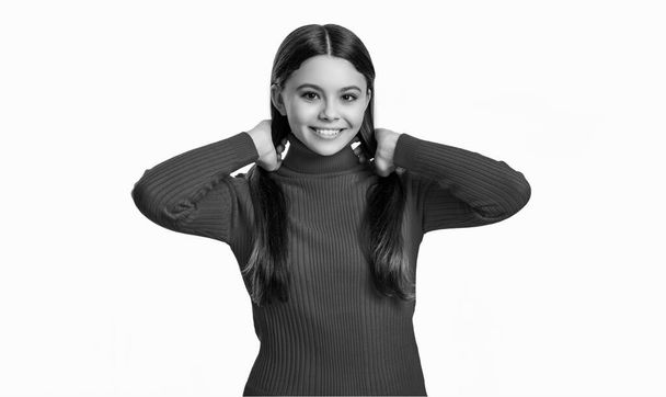 photo portrait of cheerful teen girl having brunette hair. teen girl portrait in sweater. teen girl portrait isolated on white background. portrait of teen girl in studio. - Valokuva, kuva