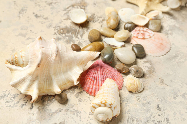 Seashells with stones and starfishes on grunge background - Φωτογραφία, εικόνα