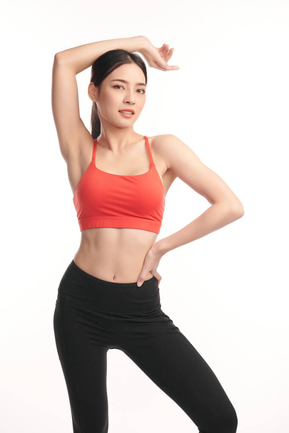 Beautiful young asian sport woman with sportswear ready for exercise on white background, Advertising sportswear and yoga wear, Healthy lifestyle, sport. - Foto, afbeelding