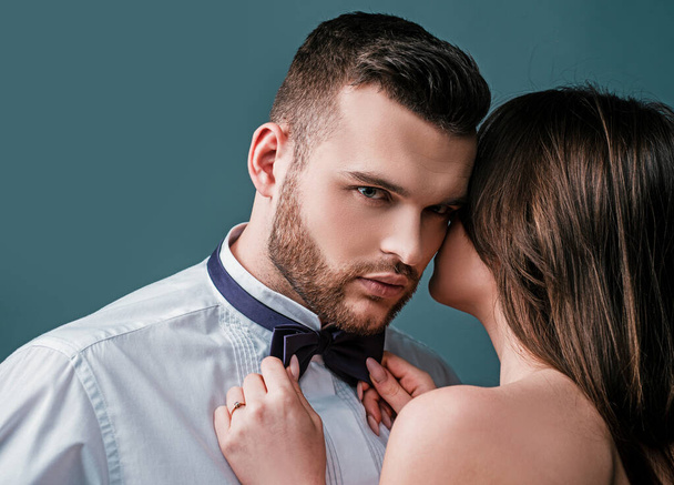Romantic moment of passionate couple. Sexy beauty couple. Kissing couple portrait. Sensual brunette woman with young lover, passionate couple foreplay closeup - Φωτογραφία, εικόνα