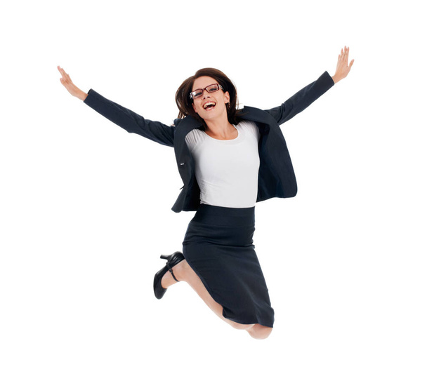 Business woman, jump celebration and studio portrait with freedom, happiness and achievement by white background. Isolated businesswoman, flying and winning with bonus, goals or profit by backdrop. - Foto, afbeelding