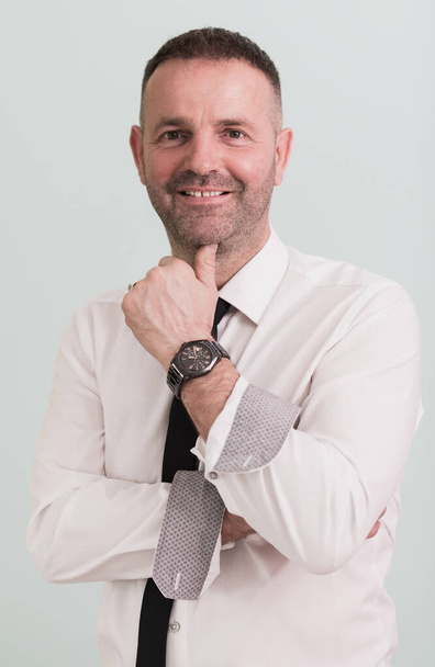 casual older with beard businessman wearing formal business clothes smiling at camera with crossed hands isolated over gray background. High quality photo - Valokuva, kuva