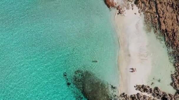 Aerial view of beautiful Nissi beach in Ayia Napa, Cyprus. Nissi beach in Ayia Napa famous tourist beach in Cyprus. A view of a azzure water and Nissi beach in Aiya Napa, Cyprus. - Footage, Video