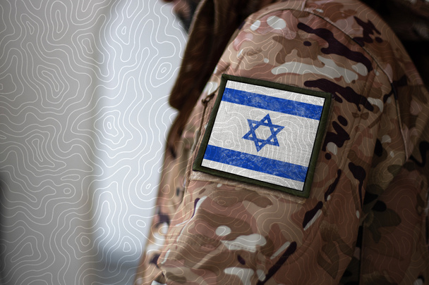 Israel Soldier. Soldier with flag Israel, Israel flag on a military uniform. Camouflage clothing - Фото, изображение