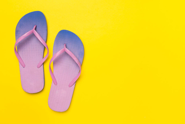 Bright flip flops on color background, top view - Fotografie, Obrázek