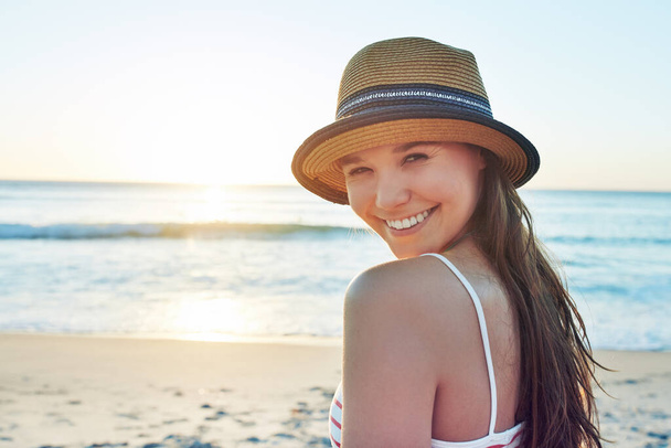 Its always a good time at the beach. a beautiful young woman spending the day at the beach - Foto, Imagem