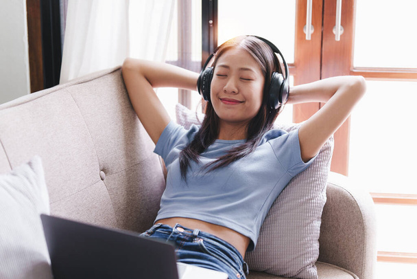 Attractive Asian woman resting comfortable living room and using laptop computer, Relax, Sofa, Lifestyle. - Φωτογραφία, εικόνα