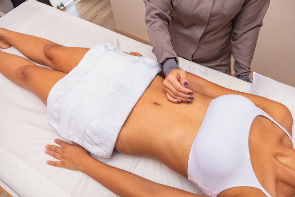 relaxing massage and modeling massage, lymphatic drainage, hand-made and aesthetic procedures - Фото, зображення