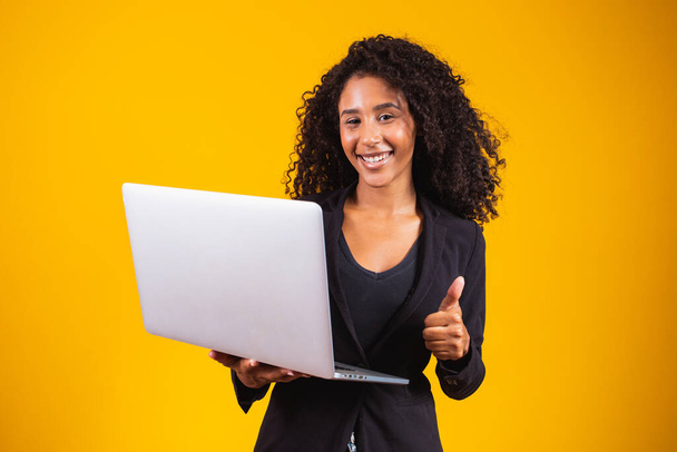 young afro woman using laptop computer - Photo, image