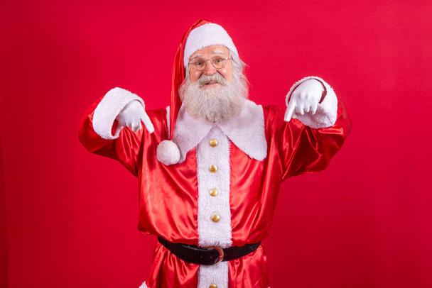real Santa Claus pointing down - Zdjęcie, obraz