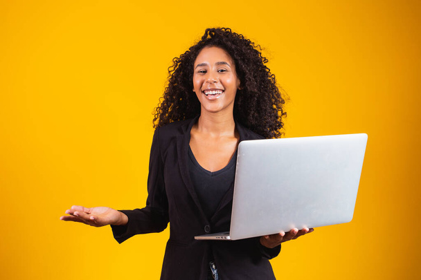 young afro woman using laptop computer - Photo, image