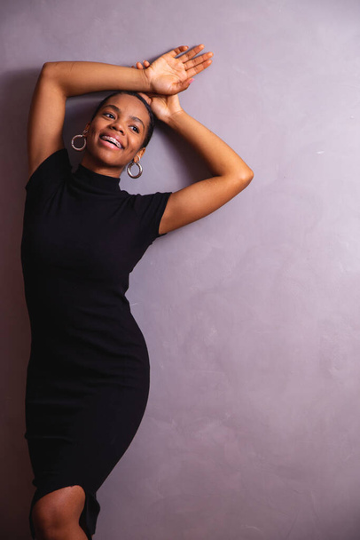 Black woman. Black woman portrait in photo studio - Фото, изображение