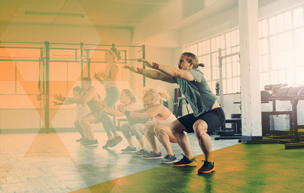 Fitness, group and people squat at gym for exercise, workout and training. Athlete men and women together for strong muscle, commitment or power challenge at health club or class with mockup overlay. - Photo, Image