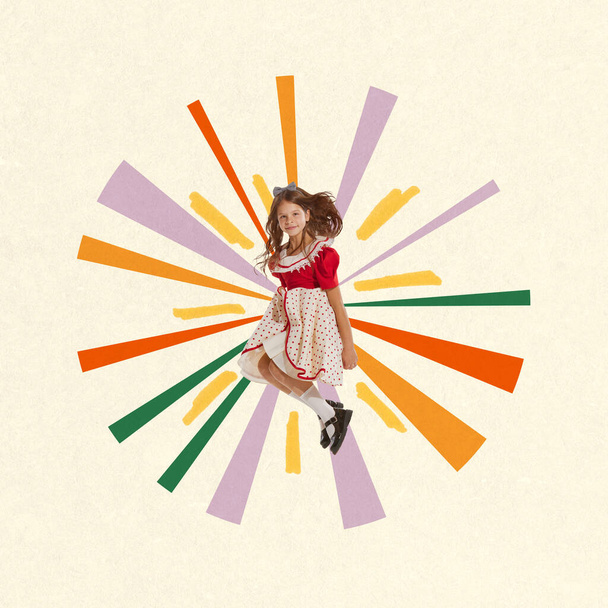 Little happy girl, child n retro style dress jumping, playing, having fun over pastel background with colorful design element. Contemporary art collage. Concept of summer, childhood, fun, inspiration - Foto, imagen